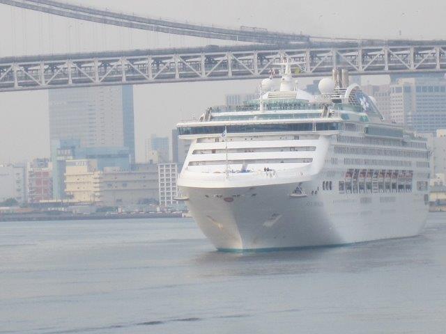 Cruising Ship under Rainbow bridge